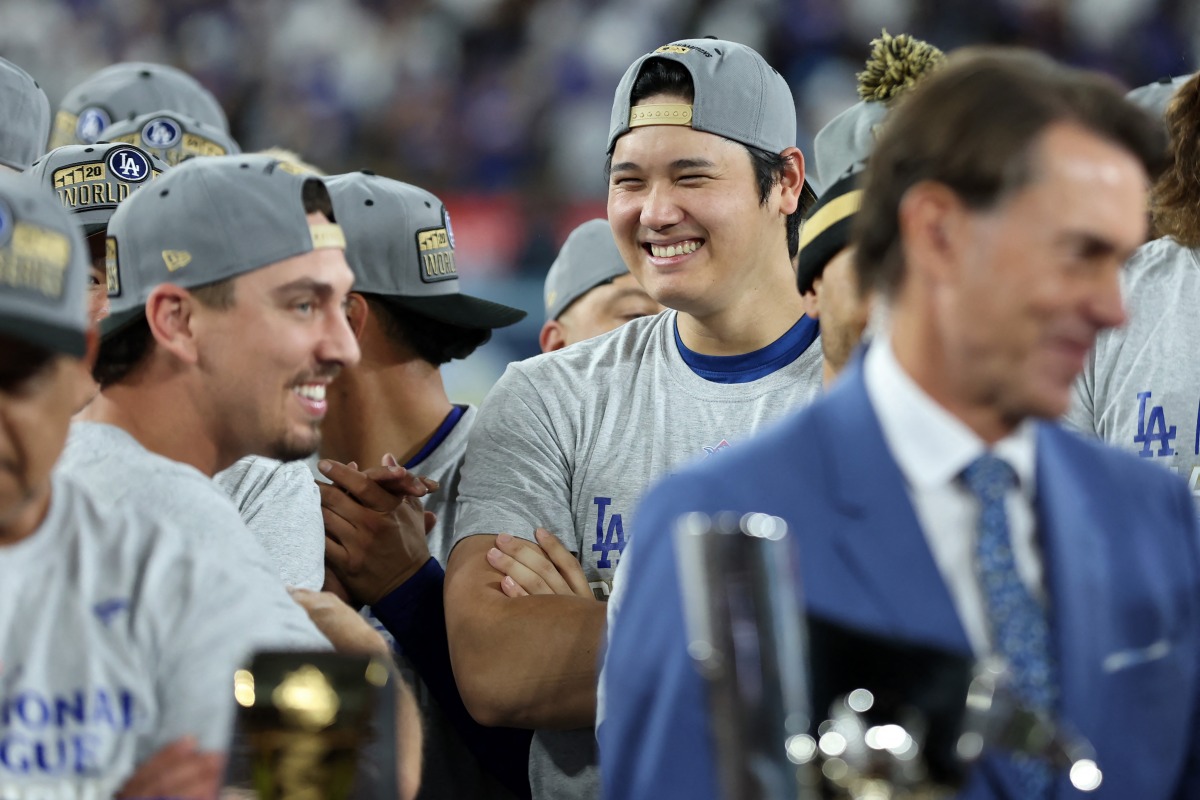 Shohei Ohtani #17 of the Los Angeles Dodgers watches the trophy presentation after the Dodgers defeated the New York Mets on October 20, 2024 in Los Angeles, California. Sean M. Haffey/Getty Images/AFP 