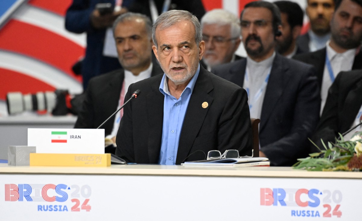 Iran's President Masoud Pezeshkian attends the extended format meeting of the BRICS summit in Kazan on October 23, 2024. Photo by Alexander NEMENOV / POOL / AFP.