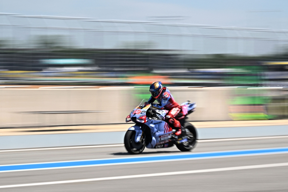 Gresini Racing's Spanish rider Marc Marquez rides out of the pit lane during the first free practice session of the MotoGP Thailand Grand Prix at the Buriram International Circuit in Buriram on October 25, 2024. (Photo by Lillian SUWANRUMPHA / AFP)