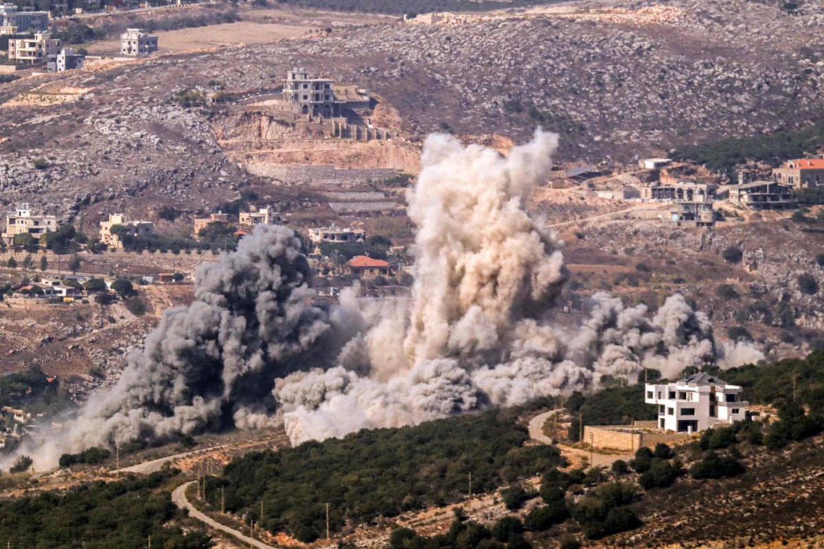 Smoke rises from the site of an Israeli airstrike that targeted the outskirts of the southern Lebanese village of Aishiyeh on October 26, 2024. (Photo by AFP)
