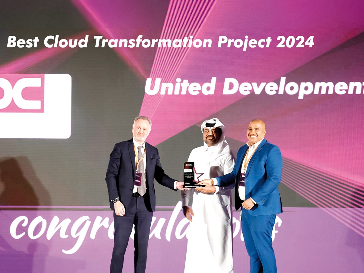 A UDC official receiving the award during the Middle East Enterprise AI & Analytics Summit and Awards held at Marsa Malaz Kempinski, The Pearl Island. 