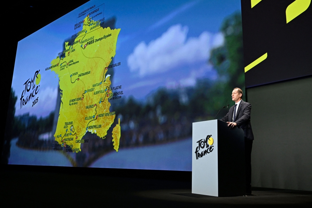 The director of the Tour de France cycling race Christian Prudhomme presents the men 2025 race route and stages during the official unveiling of both men and women 2025 editions of the Tour de France routes in Paris on October 29, 2024. Photo by JULIEN DE ROSA / AFP