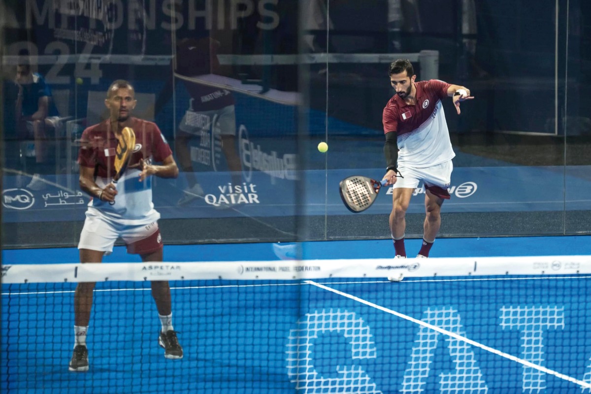 Qatar players in action during their tie against Uruguay.