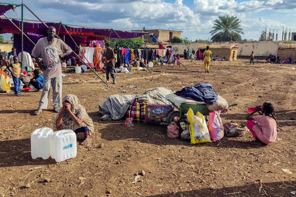 Sudanese people fleeing the Jazirah district arrive at a camp for the displaced in the eastern city of Gedaref on October 31, 2024. (Photo by AFP)