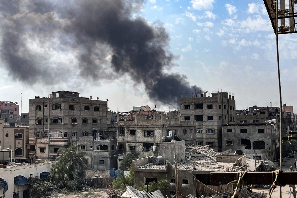 This picture taken from Beit Lahya shows smoke rising in the adjacent neighbourhood of Jabalia in the northern Gaza Strip, during an Israeli strike on November 1, 2024. Photo by AFP