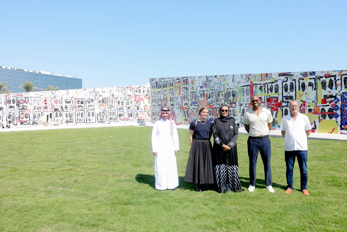 Chairperson of Qatar Museums H E Sheikha Al Mayassa bint Hamad bin Khalifa Al Thani and internationally acclaimed artist Rashid Johnson with other officials during the unveiling of the public artwork Village of the Sun.