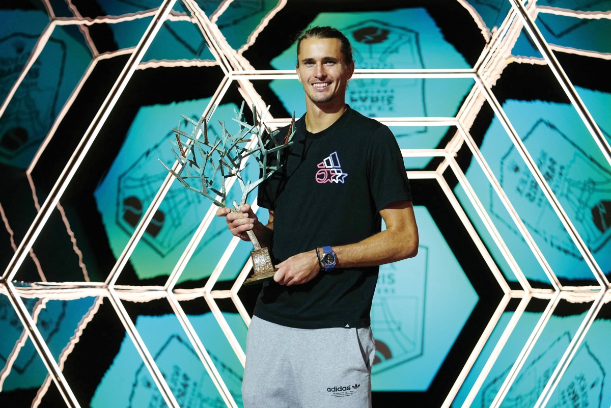 Alexander Zverev poses with the Paris Masters trophy. 