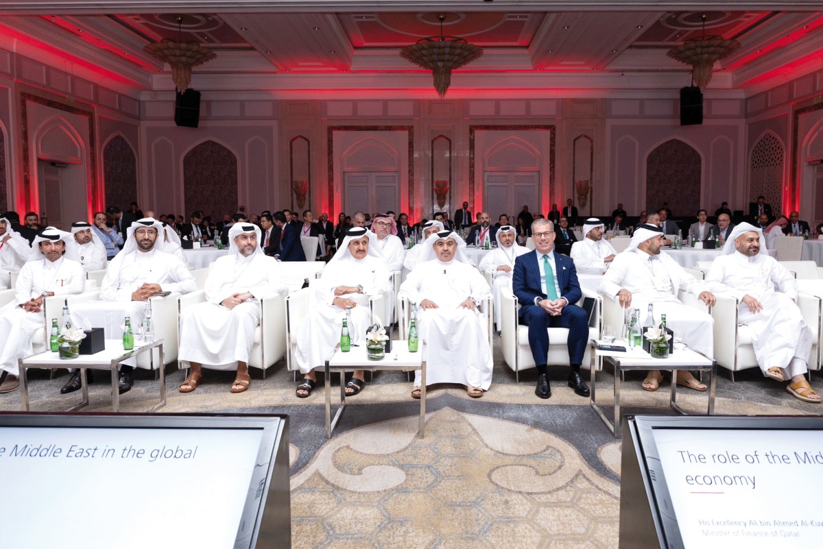 Minister of Finance H E Ali bin Ahmed Al Kuwari with other dignitaries during the summit, yesterday.