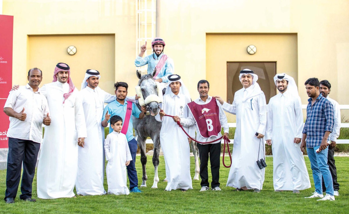 The connections of Fuwayrit (IRE) celebrate after winning the Purebred Arabian Maiden Plate, 4YOs at the second Al Rayyan Race Meeting - Sealine Cup (Div1), yesterday. Pictures: Juhaim/QREC
