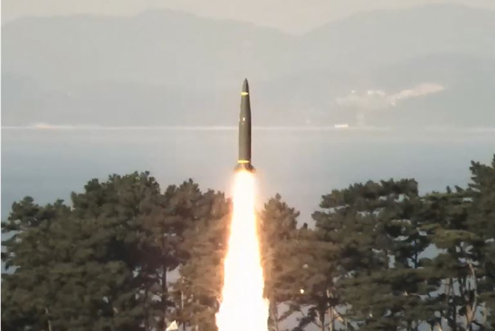 An handout photo taken on November 7, 2024, and provided by South Korean Defence Ministry on November 8, 2024 shows a Hyunmoo-2 surface-to-surface short-range missile being launched into the West Sea. (Photo by Handout / South Korean Defence Ministry / AFP)