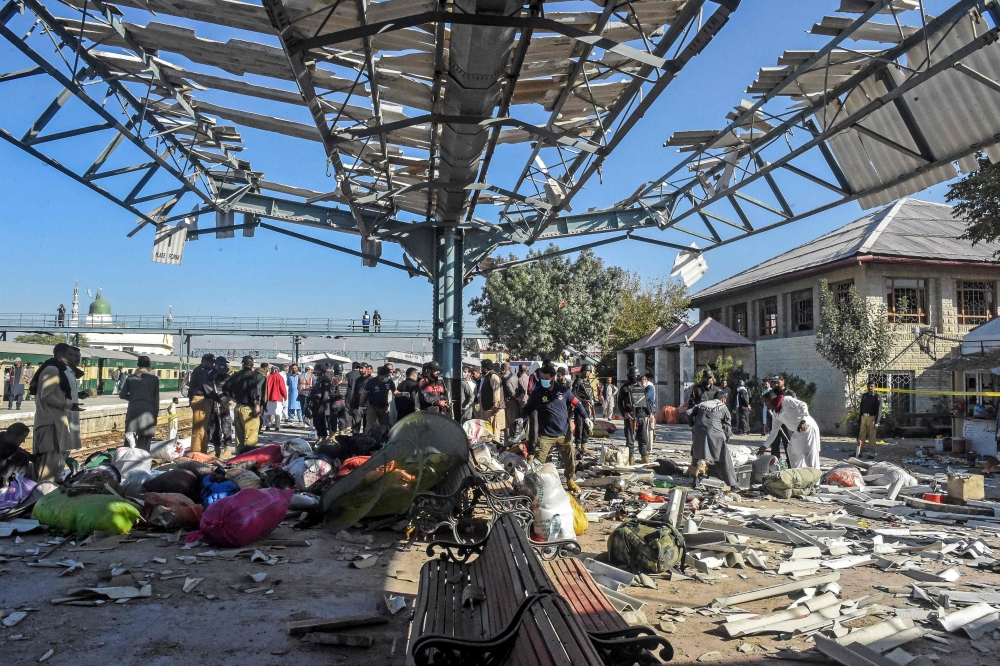 Passengers' belongings are seen scattered on the platform after an explosion at a railway station in Quetta, in Pakistan's Balochistan province, on November 9, 2024. (Photo by Banaras KHAN / AFP)