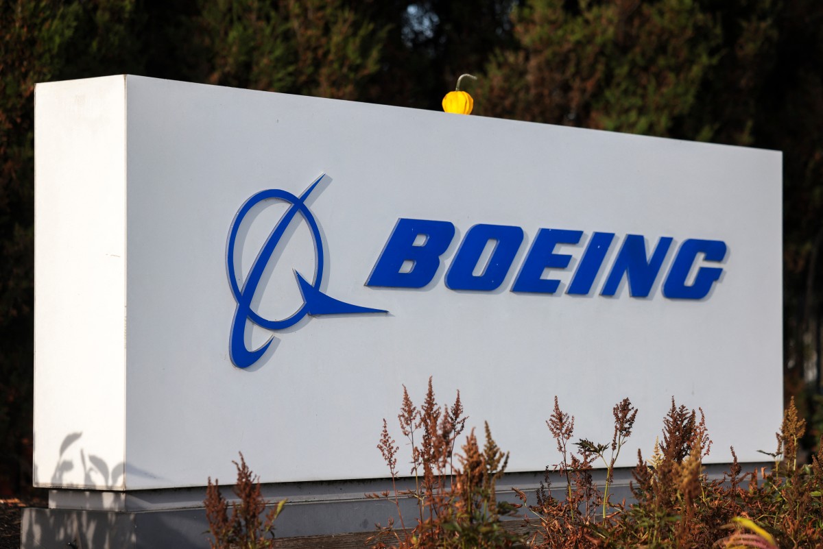 A Boeing sign is pictured outside the Renton Production Facility one day before striking union members will vote on a new contract offer in Renton, Washington on November 3, 2024. Photo by Jason Redmond / AFP