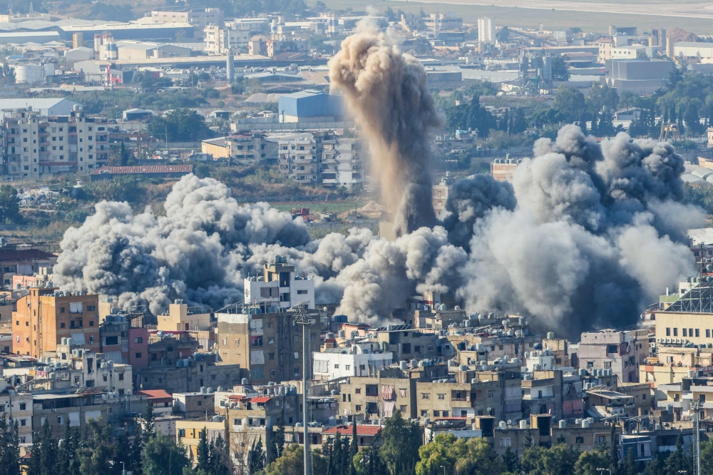 Smoke plumes rise after an Israeli airstrike on the Chouaifet neighborhood in southern Beirut on November 14, 2024. (Photo by Anwar Amro / AFP)