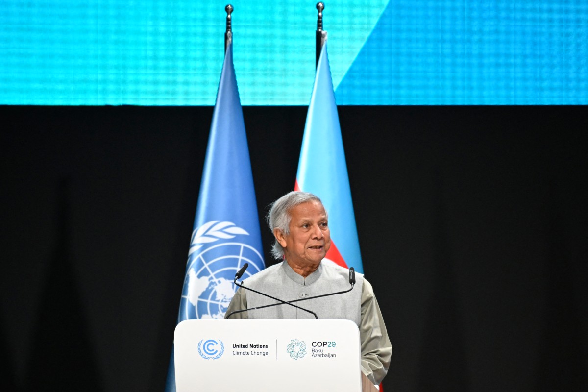 (Files) Bangladesh's interim leader Muhammad Yunus gives a speech during the United Nations Climate Change Conference (COP29) in Baku on November 13, 2024. Photo by Alexander Nemenov / AFP.