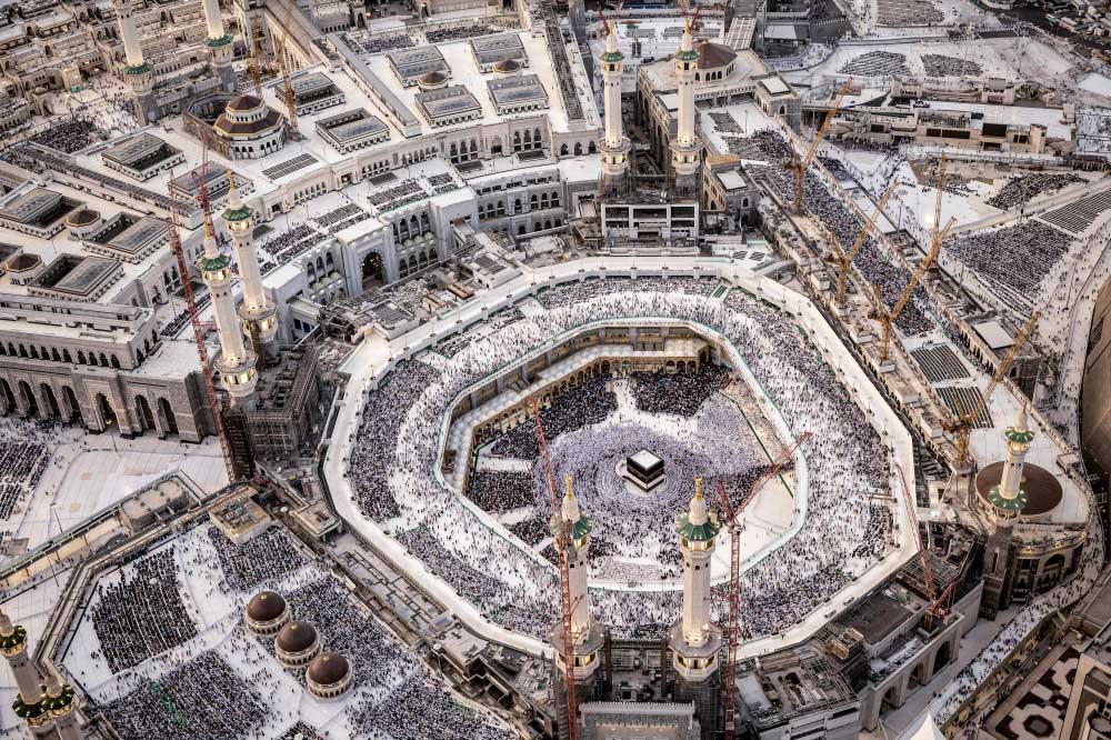 Worshippers pray around the Kaaba, Islam's holiest shrine, at the Grand Mosque in Saudi Arabia's holy city of Mecca on June 11, 2024. Photo by Fadel Senna / AFP.