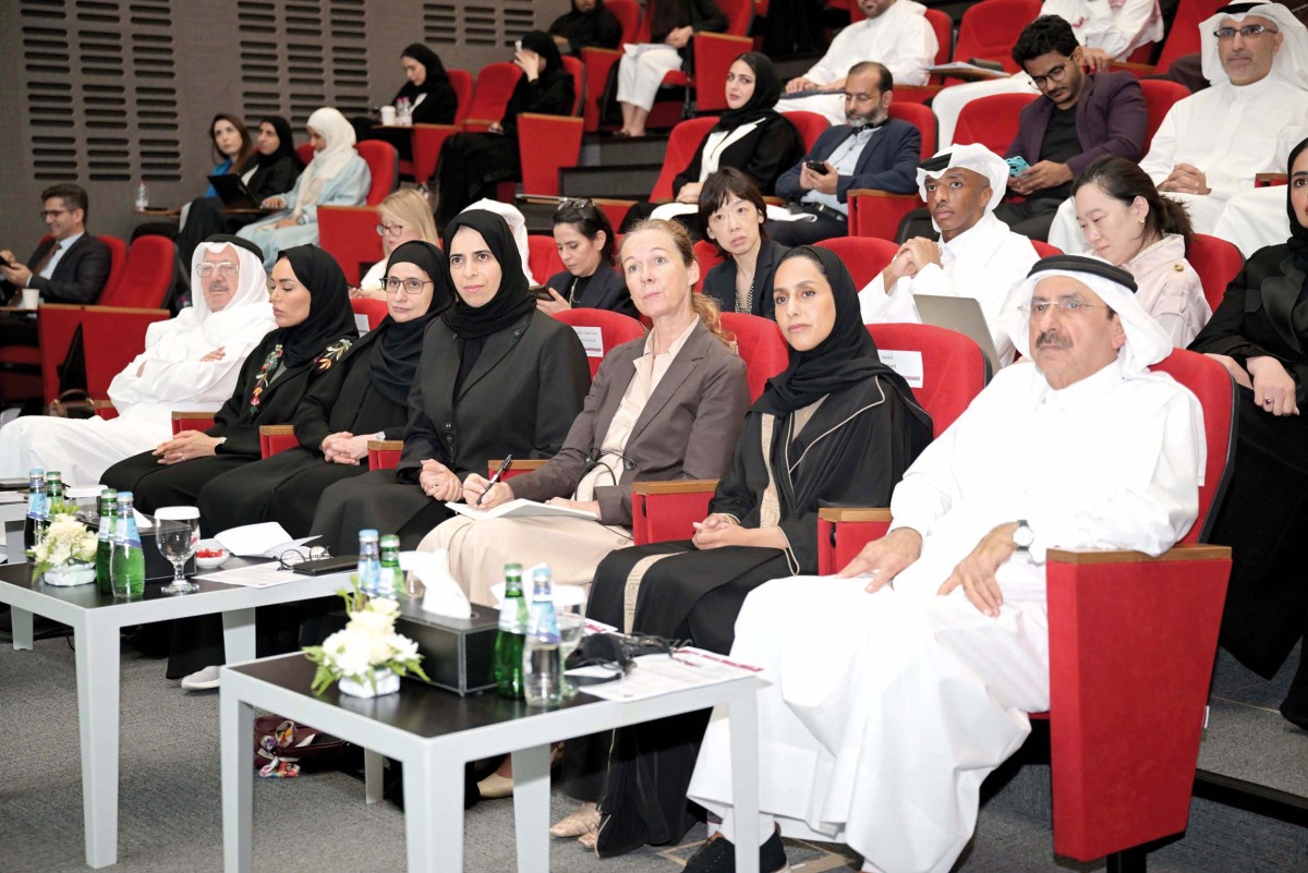 Minister of Education and Higher Education H E Lolwah bint Rashid Al Khater (fourth right) and other officials at the Ninth Annual Interdisciplinary Conference held at Qatar University.