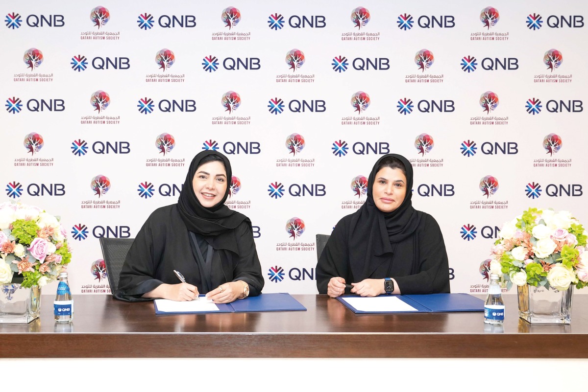 Senior Executive Vice President of Group Communication at QNB Heba Al Tamimi and Chairperson of Qatari Autism Society Sheikha Jawaher bint Fahad bin Jassim bin Jaber Al Thani during the agreement signing.