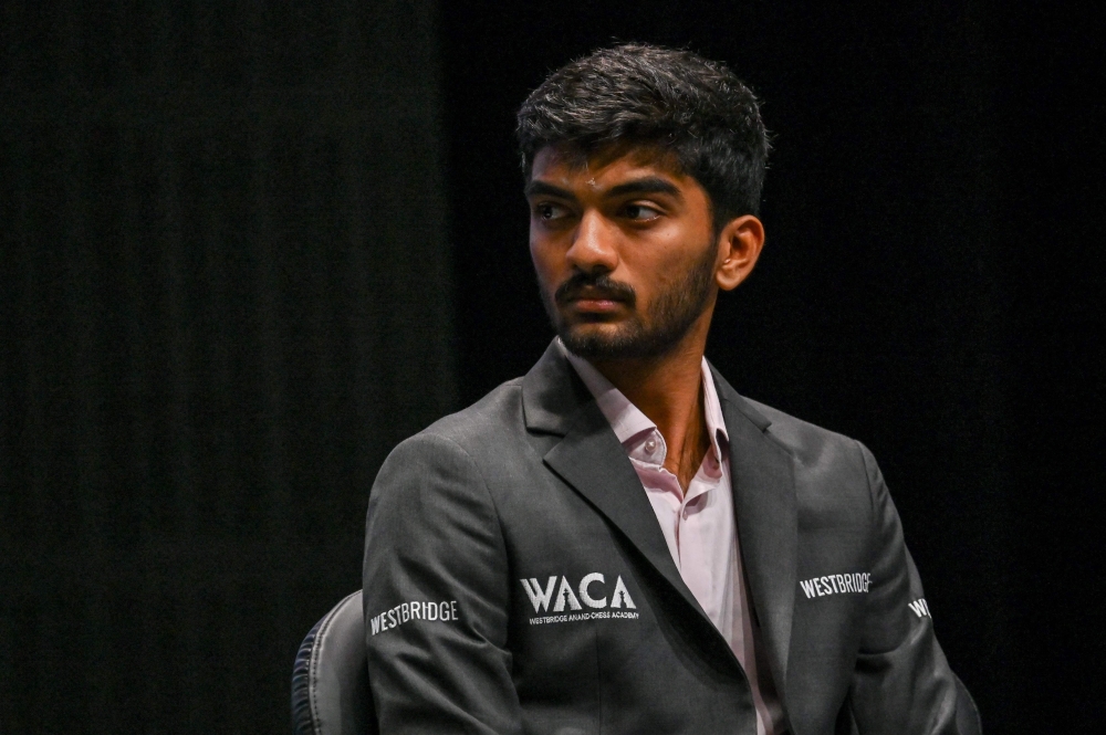 India's chess grandmaster Gukesh Dommaraju attends a press conference ahead of the FIDE World Chess Championship in Singapore on November 23, 2023. (Photo by Roslan Rahman / AFP)
 