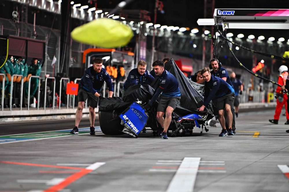 The car of Franco Colapinto of Argentina and Williams is returned to the pitlane after a crash during qualifying ahead of the F1 Grand Prix of Las Vegas at Las Vegas Strip Circuit on November 22, 2024 in Las Vegas, Nevada. Rudy Carezzevoli/Getty Images/AFP