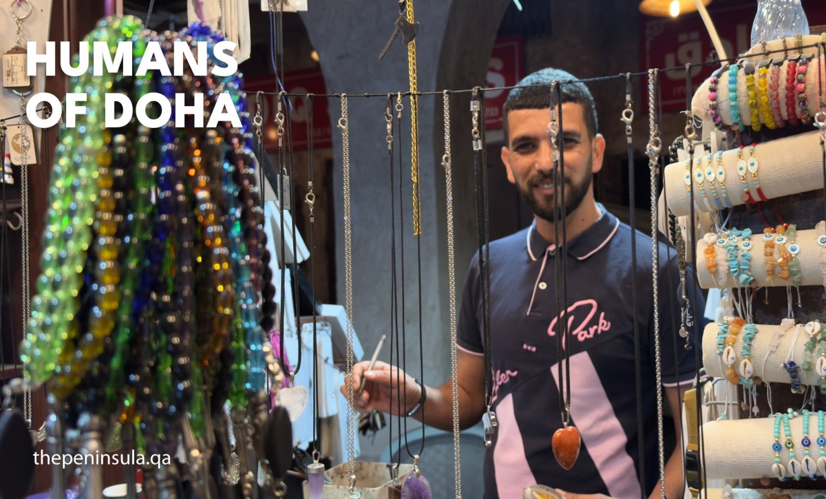 Ahmed Yaagoub, the name writer artist, holding a special etching tool in his workshop in Souq Waqif. Photo taken by Oussama Abbassi.