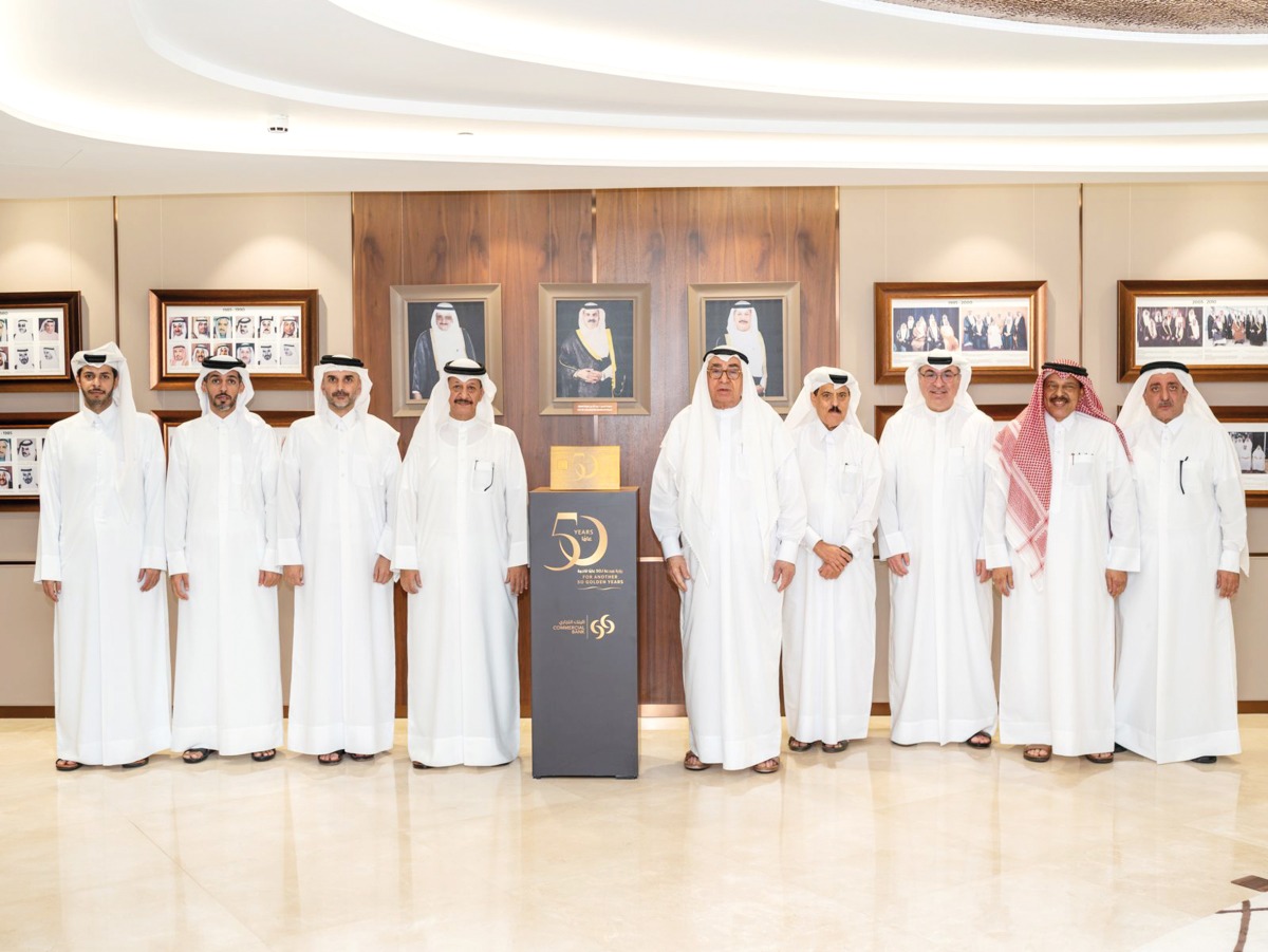 Managing Director of Commercial Bank Omar Hussain Alfardan with other officials during the event.