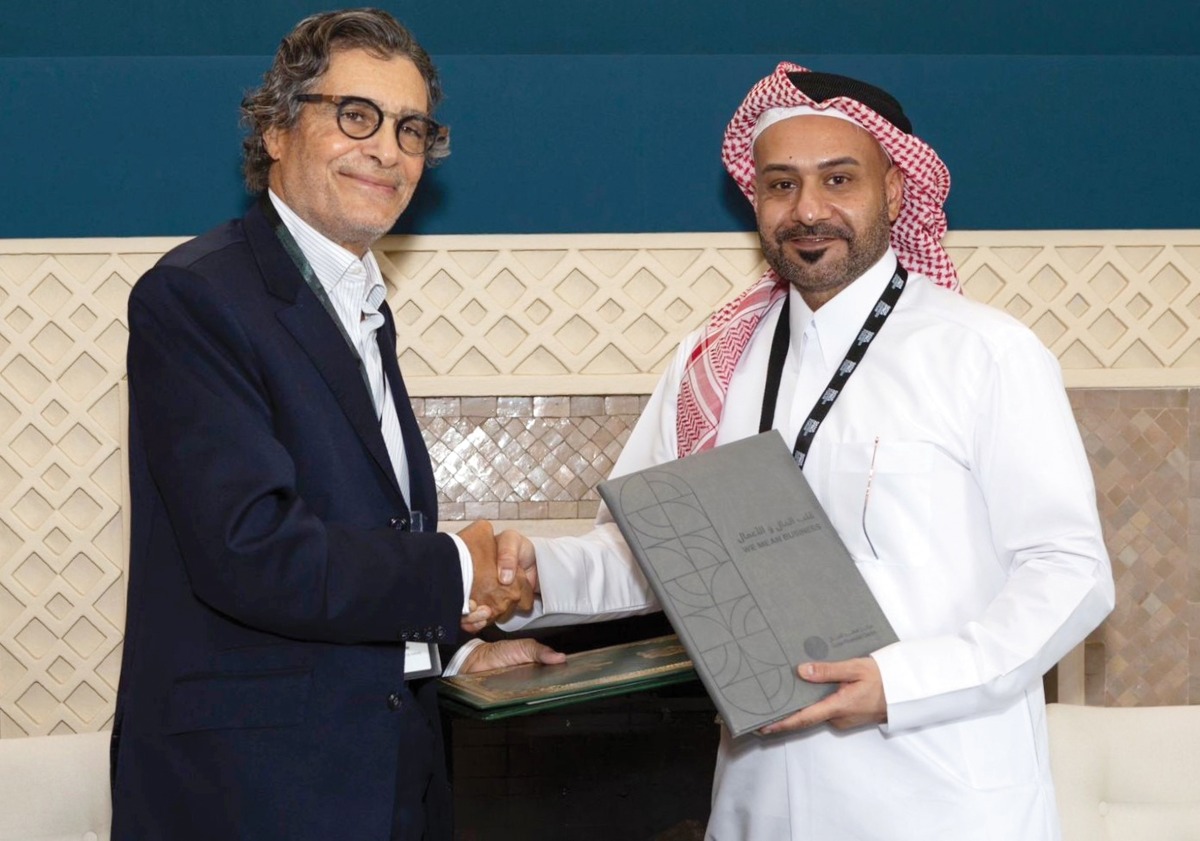 Chief Executive Officer at QFC, Yousuf Mohamed Al Jaida and Chief Executive Officer at CFC, Said Ibrahimi during the MoU signing. 