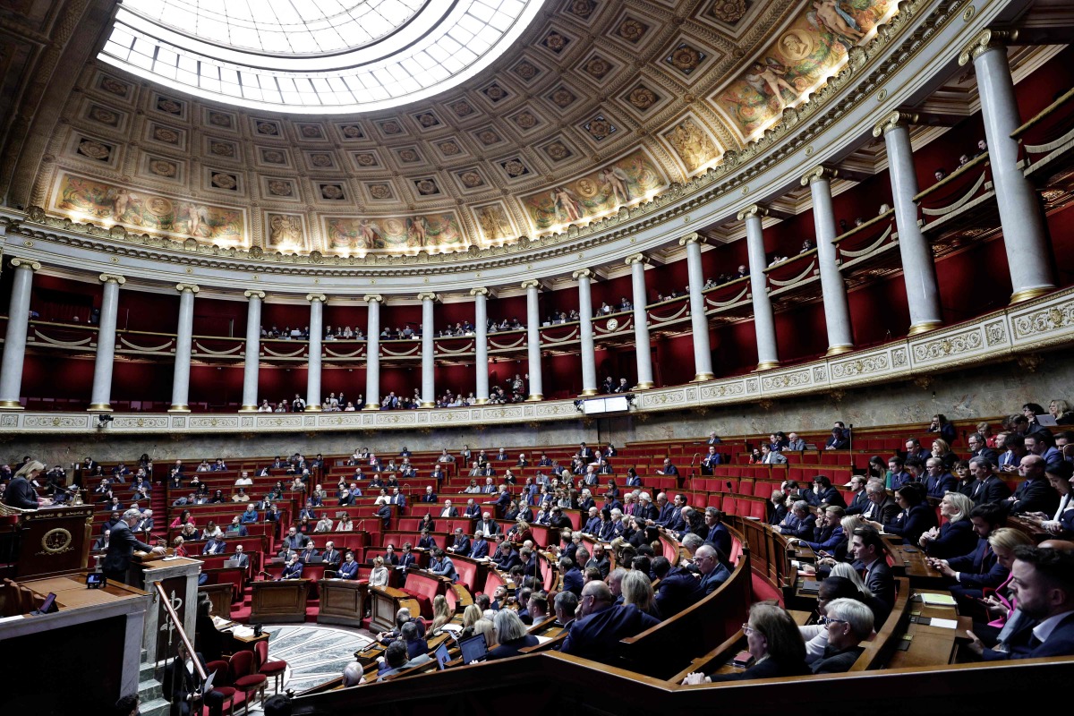 General view taken during the voting session on the draft of the Social Security bill 2025 at the National Assembly, the French Parliament's lower house, in Paris on December 2, 2024. (Photo by STEPHANE DE SAKUTIN / AFP)
