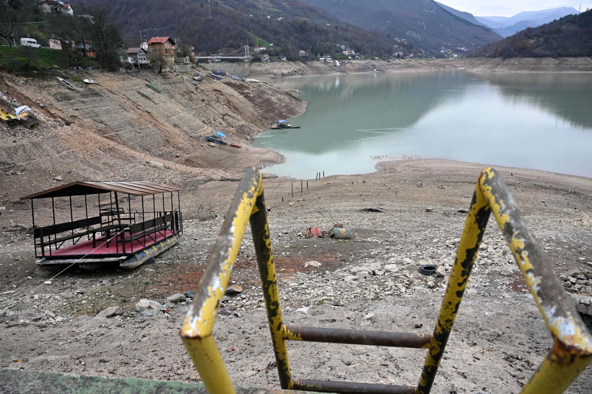 This photograph shows the shore of the Jablanicko artificial lake, through which the Neretva River flows, near the Bosnian town of Konjic, on December 5, 2024. Photo by ELVIS BARUKCIC / AFP