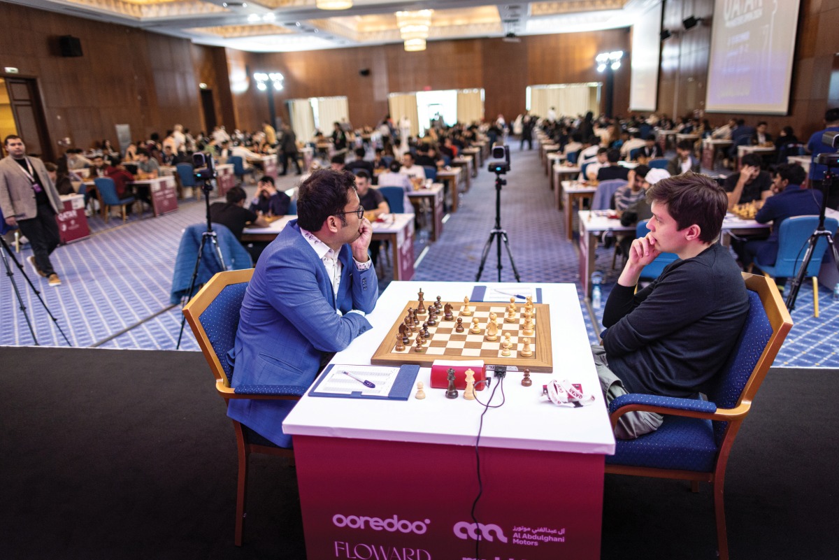 Indian Grandmaster Surya Shekhar Ganguly (left) and Andrey Esipenko, competing under the FIDE flag, during their Qatar Masters Open Round 3 match yesterday.