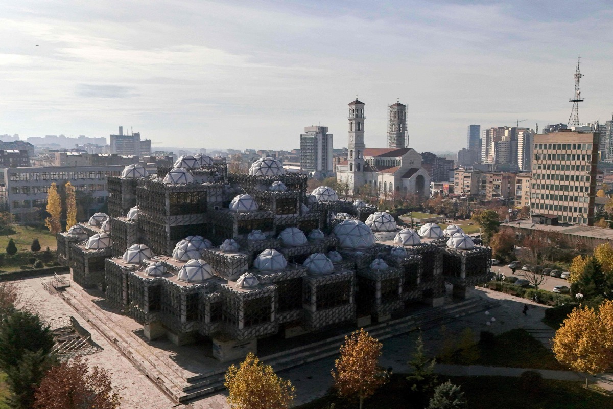 This aerial photograph shows the domes of the National Library of Kosovo, in Pristina on November 19, 2024. Photo by Kushtrim Kadriu / AFP