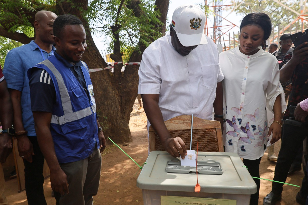 Former Ghana President and presidential candidate of the National Democratic Congress (NDC) party John Mahama casts his ballot at a polling station in Bole on December 7, 2024 during the Ghana presidential and parliamentary elections. (Photo by Nipah Dennis / AFP)
