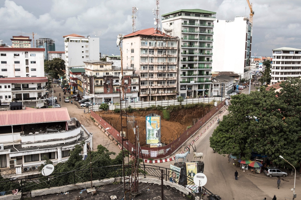 A picture taken in Conakry on October 12, 2020, shows a view of the city centre. (Photo by JOHN WESSELS / AFP)