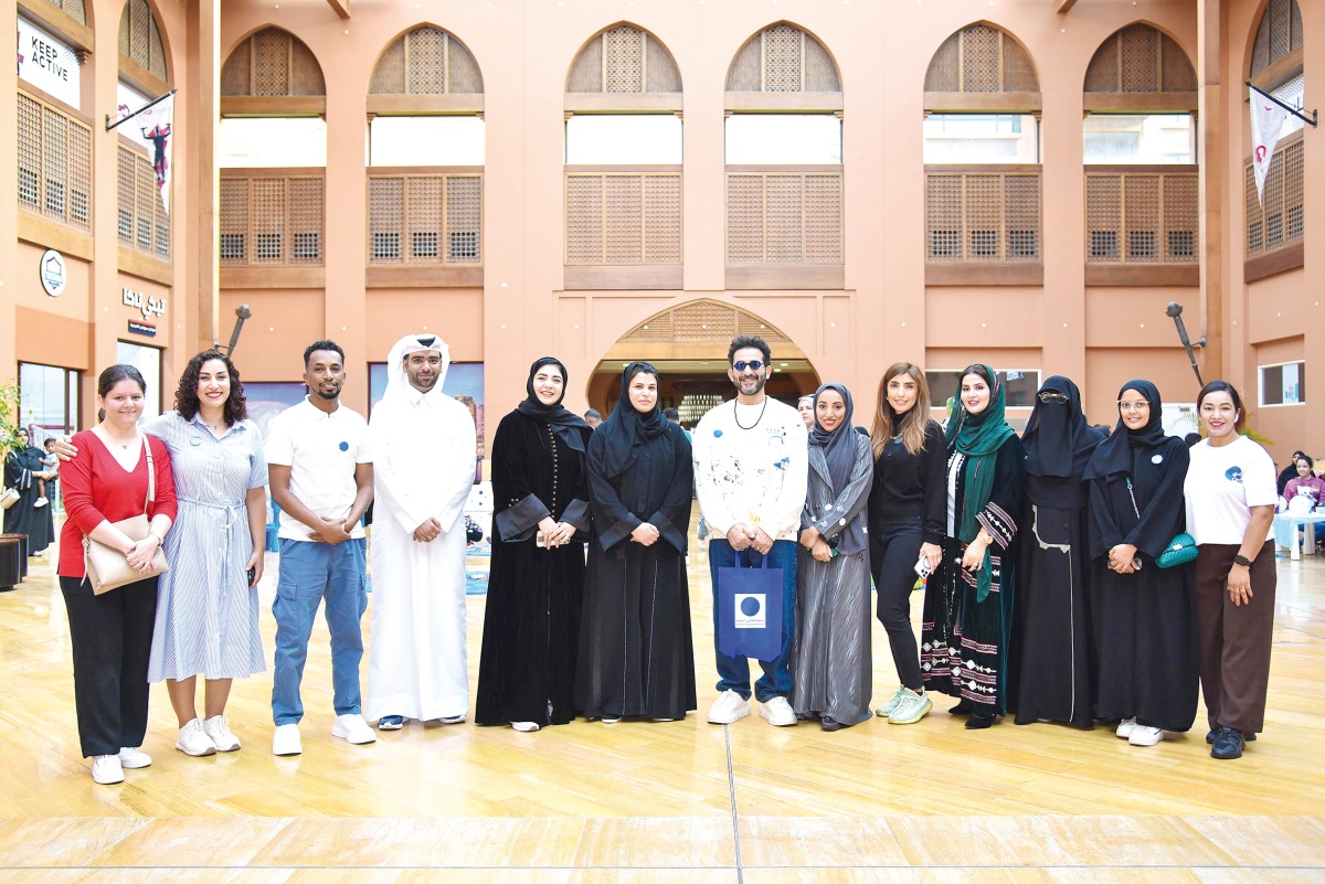 QNB officials along with the Group's brand ambassador, Ahmed Helmy attending the event. 