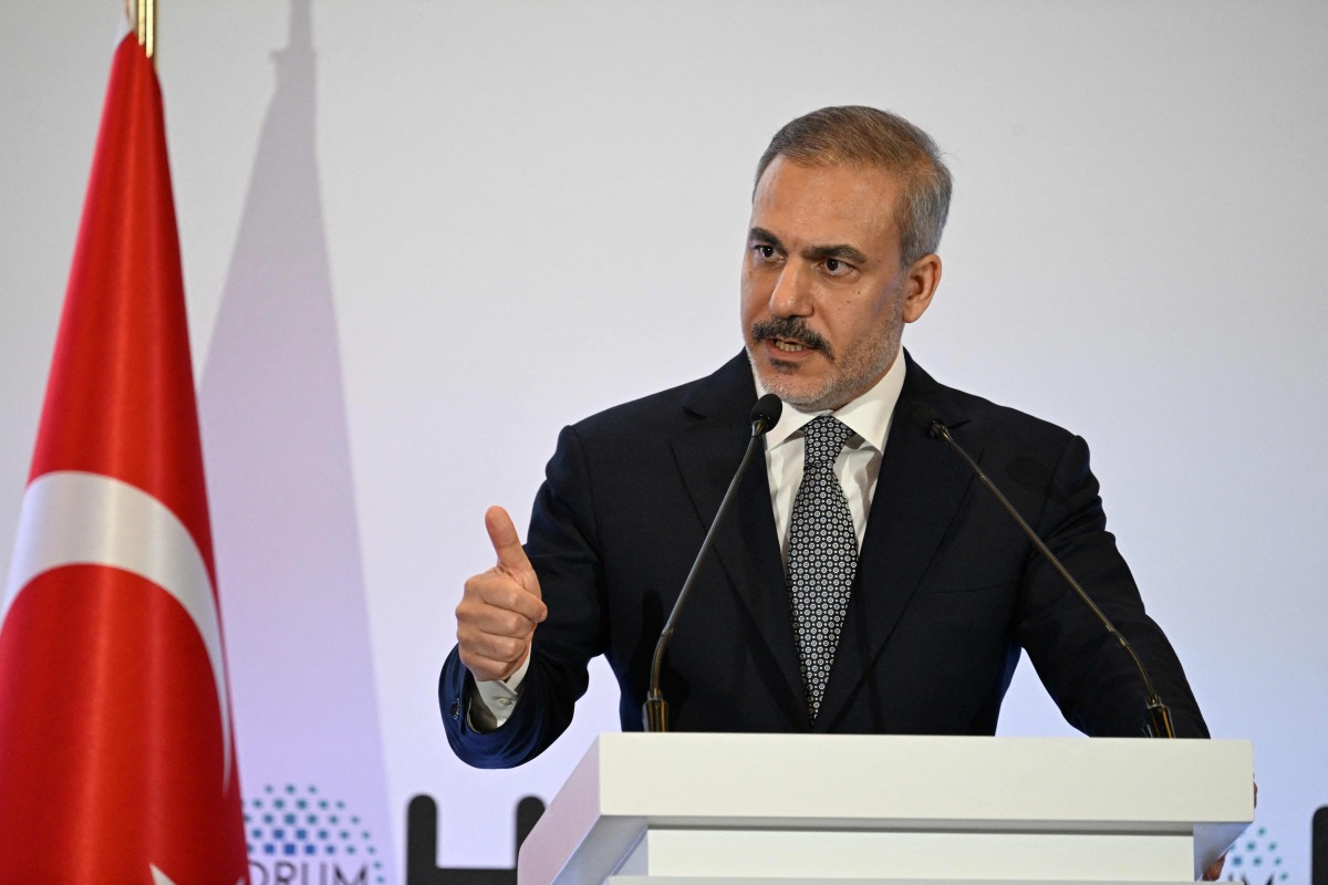 urkish Foreign Minister Hakan Fidan addresses the Doha Forum in the Qatari capital on December 8, 2024. (Photo by Mahmud HAMS / AFP)