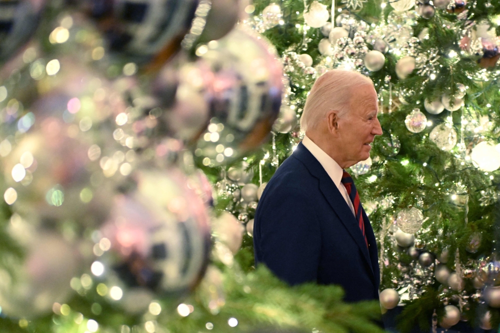 
US President Joe Biden enters the East Room of the White House in Washington, DC, on December 6, 2024. (Photo by Roberto Schmidt / AFP)