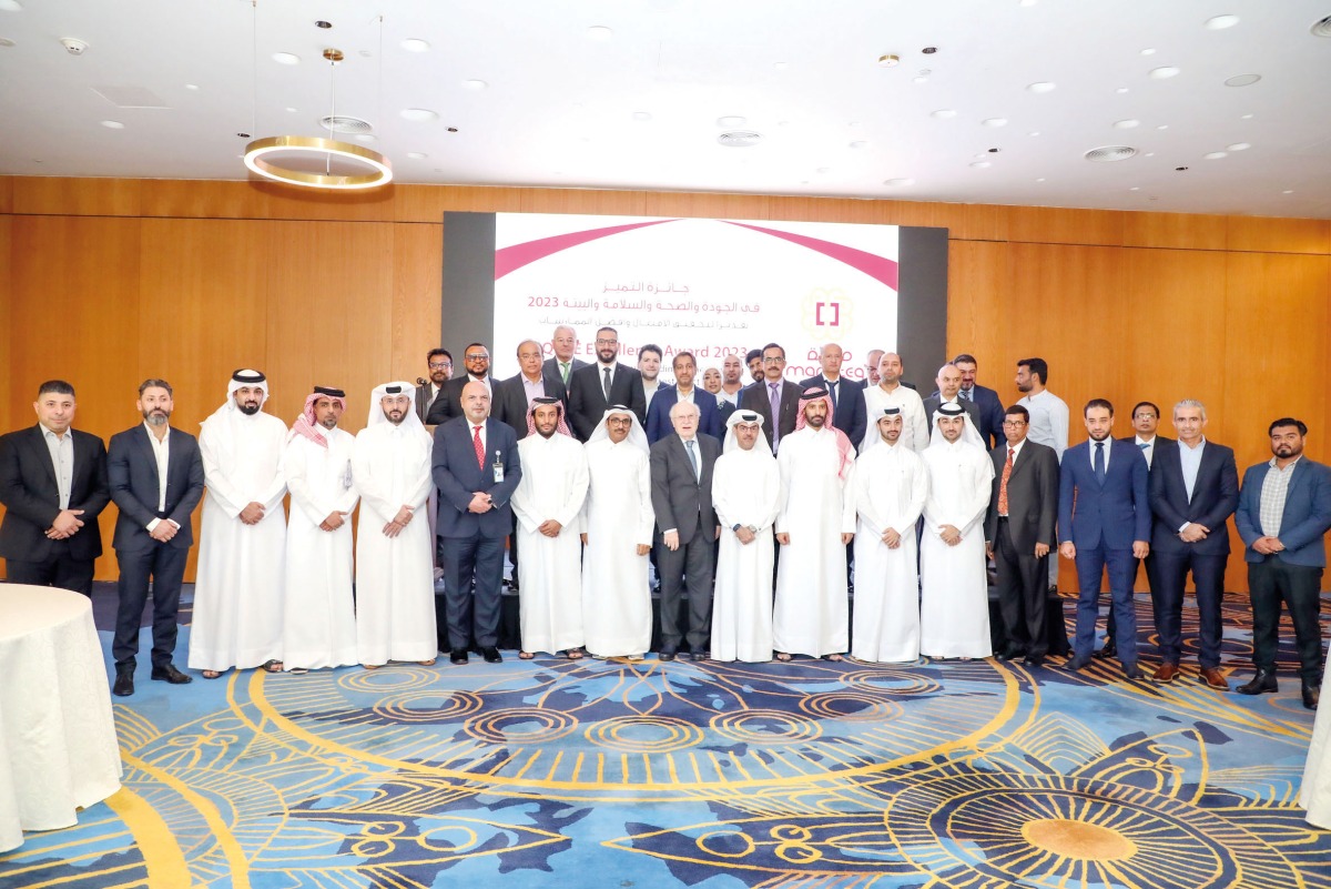 Officials pose for a group photo with the awardees during the honoring ceremony.