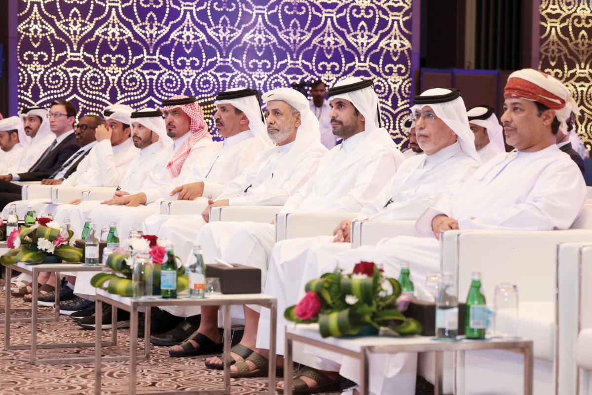 Dar Al Sharq CEO Abdul Latif Abdullah Al Mahmoud; Director of Land Transport Licensing Department at Ministry of Transport Hamad Ali Al Marri;  and Deputy CEO of Dar Al Sharq and Editor-in-Chief of Al Sharq Jaber Al Harami with other officials and guest during the conference.