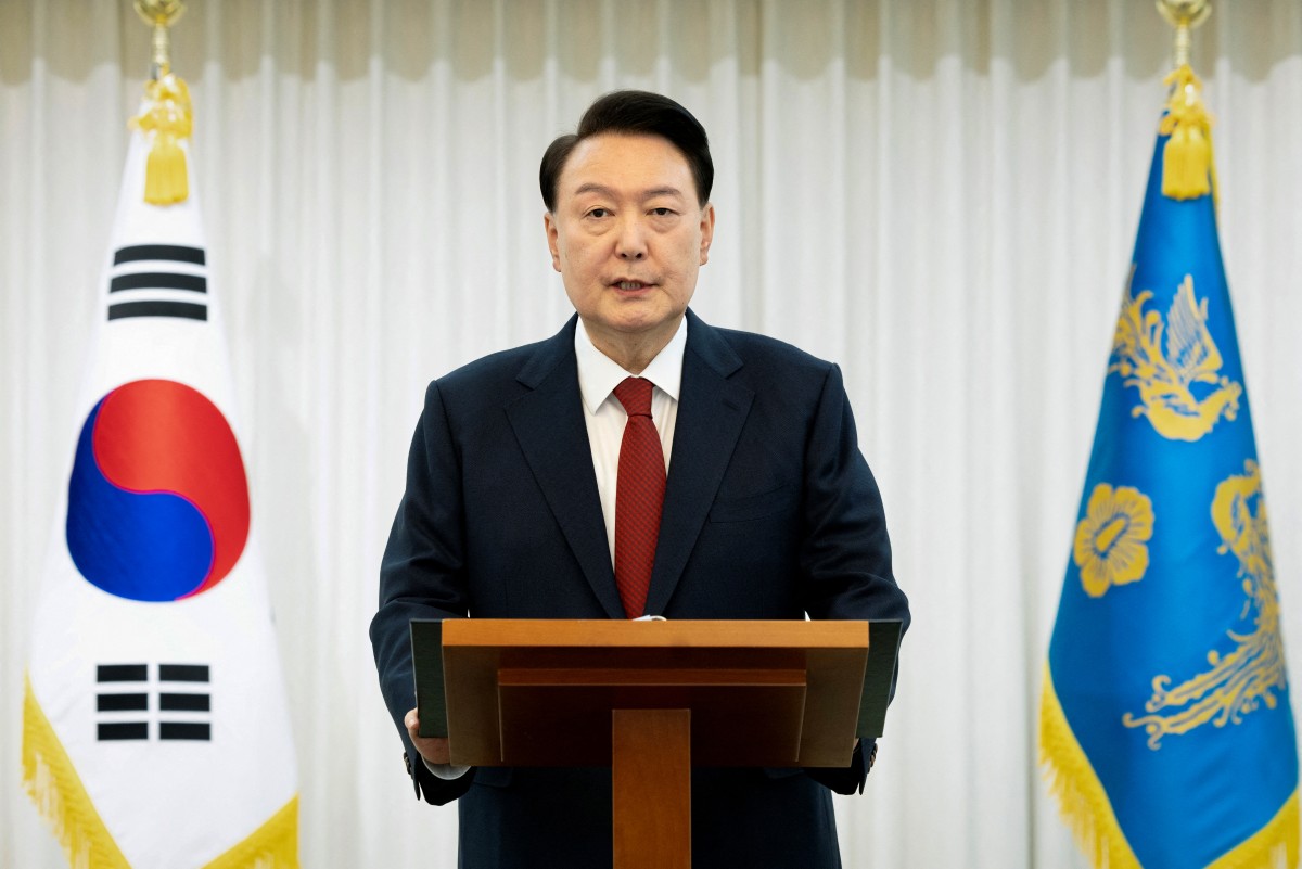 This handout photo taken on December 14, 2024 and released by the South Korean Presidential Office shows President Yoon Suk Yeol giving a public address from his official residence in Seoul. Photo by Handout / South Korean Presidential Office / AFP

