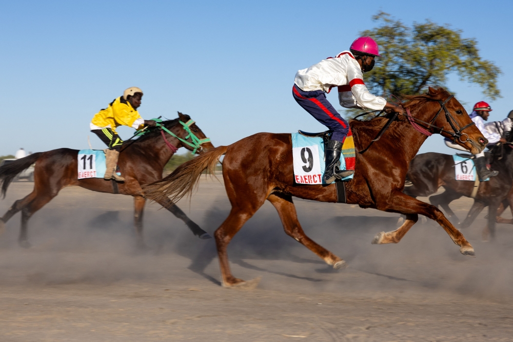 Jockeys take part in the first horse race of the season at the Biligoni racecourse in Chad on November 30, 2024. (Photo by Joris Bolomey / AFP)