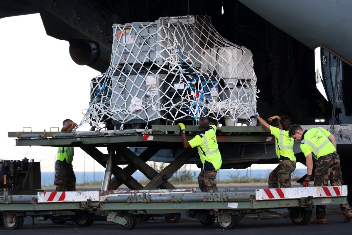 French military unload medical and emergency equipment from the A440M military aircraft, aboard of which rescue teams were transported in an emergency response, bringing aid to the small French Indian Ocean territory of Mayotte, almost cut off from the world after the passage of cyclone Chido, at the French Air Force Base 181 Saint-Denis-La Reunion 