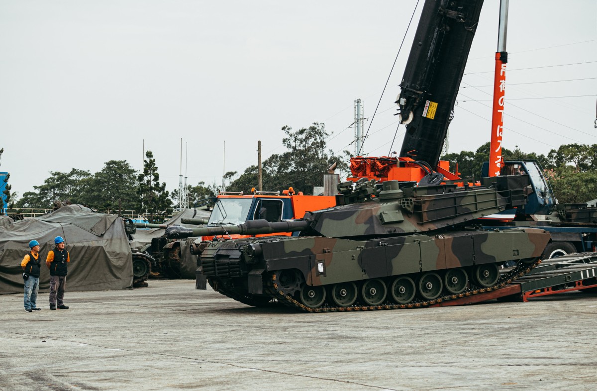 This handout photo taken and released on December 16, 2024 by Taiwan's Ministry of National Defense shows a US-made M1A2 Abrams battle tank rolling down from a trailer at an army armour training centre in Hsinchu County, Hsinchu. Photo by Handout / Taiwan's Ministry of National Defense / AFP.