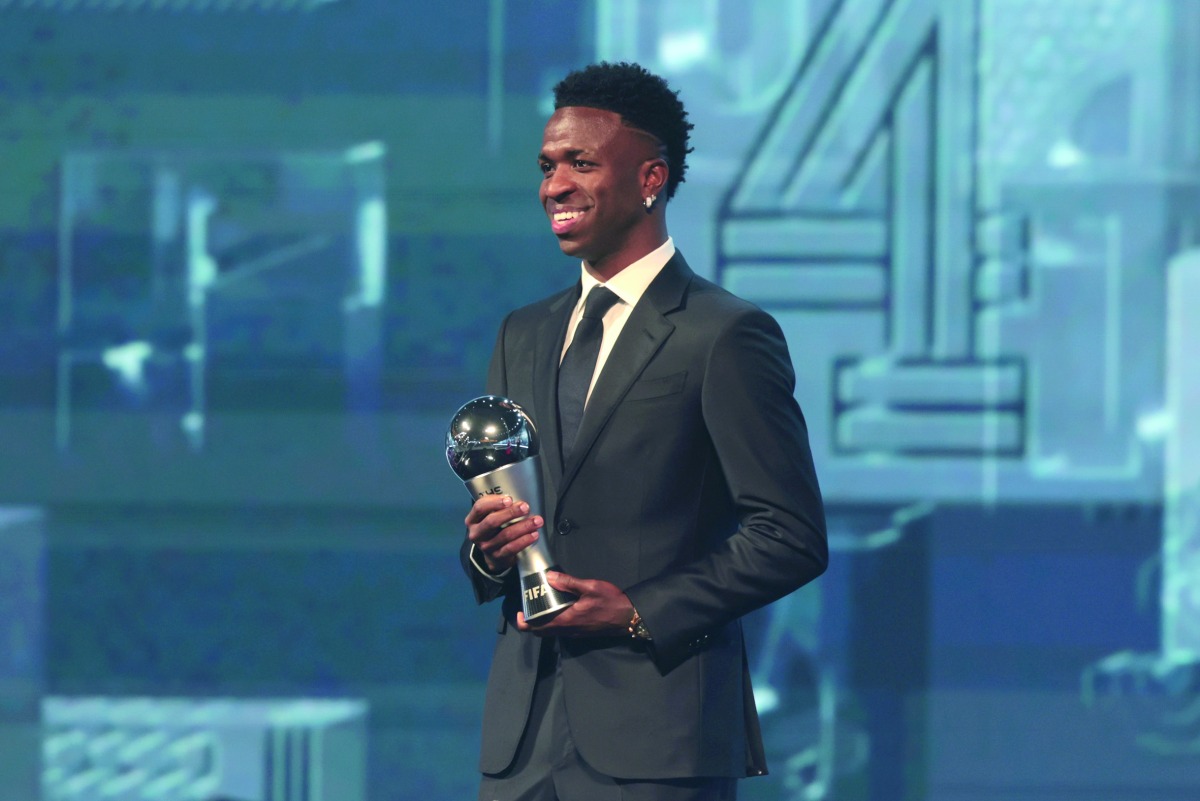 Vinicius Junior of Real Madrid poses for a photo after receiving the Best FIFA Men’s Player Award.