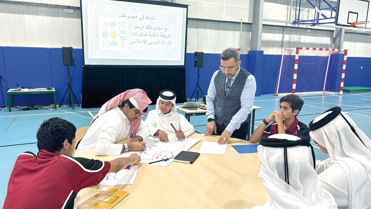 A teacher and students during an activity session in one of the Qatar Foundation schools.