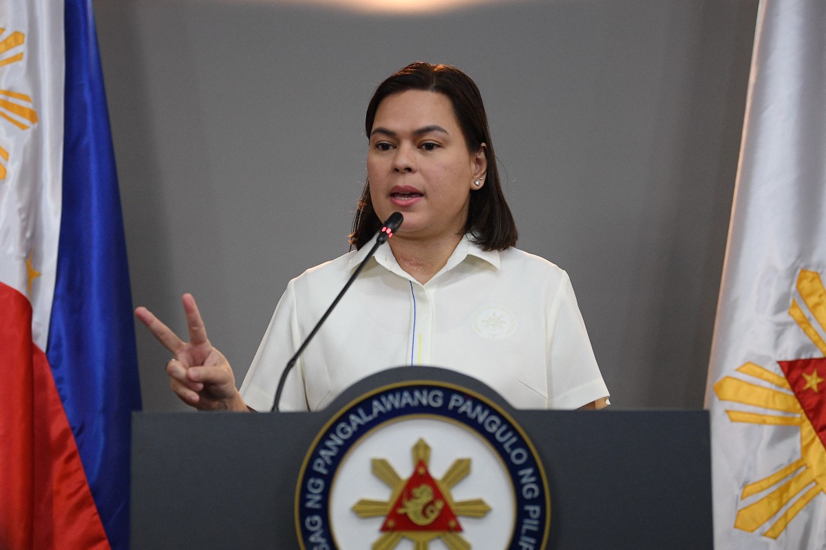 Philippine Vice-President Sara Duterte speaks during a press conference at her office in Manila on December 11, 2024. (Photo by TED ALJIBE / AFP)
