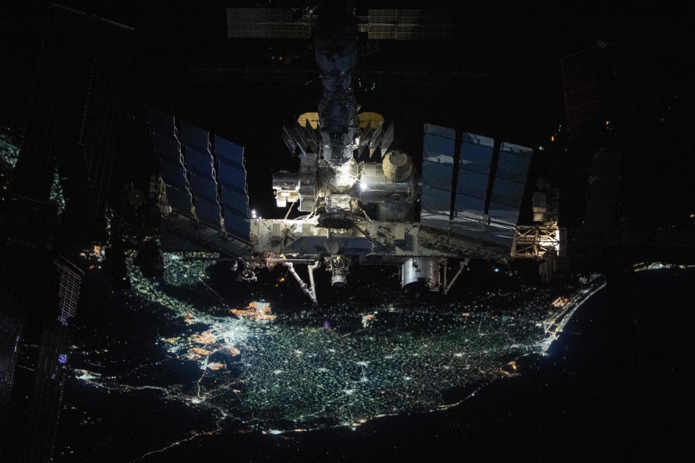 This handout image released by Nasa on September 19, 2024 shows the International Space Station pictured from the SpaceX Crew Dragon Endeavour during a fly around of the orbiting lab that took place following its undocking from the Harmony module's space-facing port on November 8, 2021. (Photo by NASA / AFP)