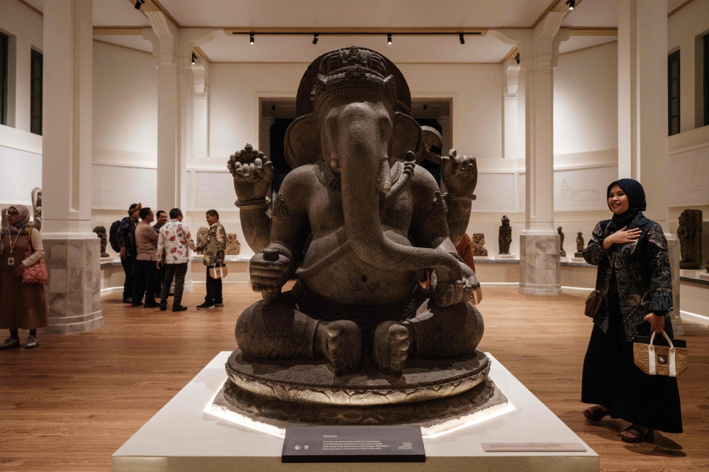 In this photo taken on October 11, 2024, the statue of Ganesha is displayed during the reopening ceremony ahead of the public opening at the National Museum of Indonesia in Jakarta. (Photo by Yasuyoshi Chiba / AFP) 