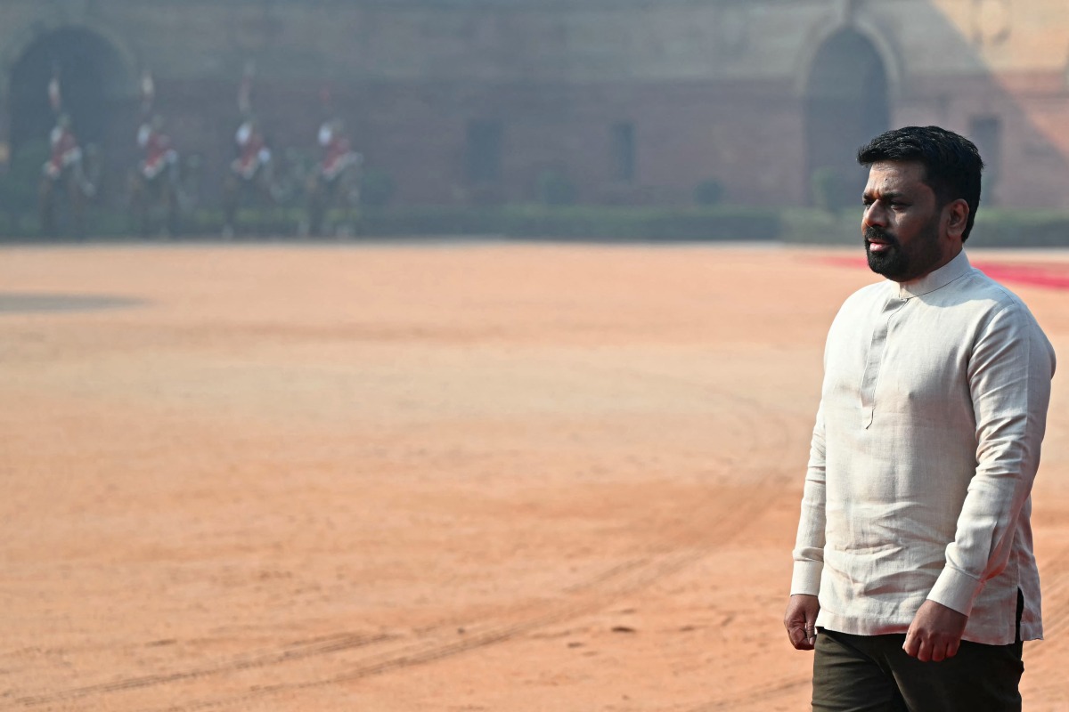 Sri Lanka's President Anura Kumara Dissanayake walks during his ceremonial reception at India's presidential palace Rashtrapati Bhavan in New Delhi on December 16, 2024. (Photo by Sajjad Hussain / AFP)