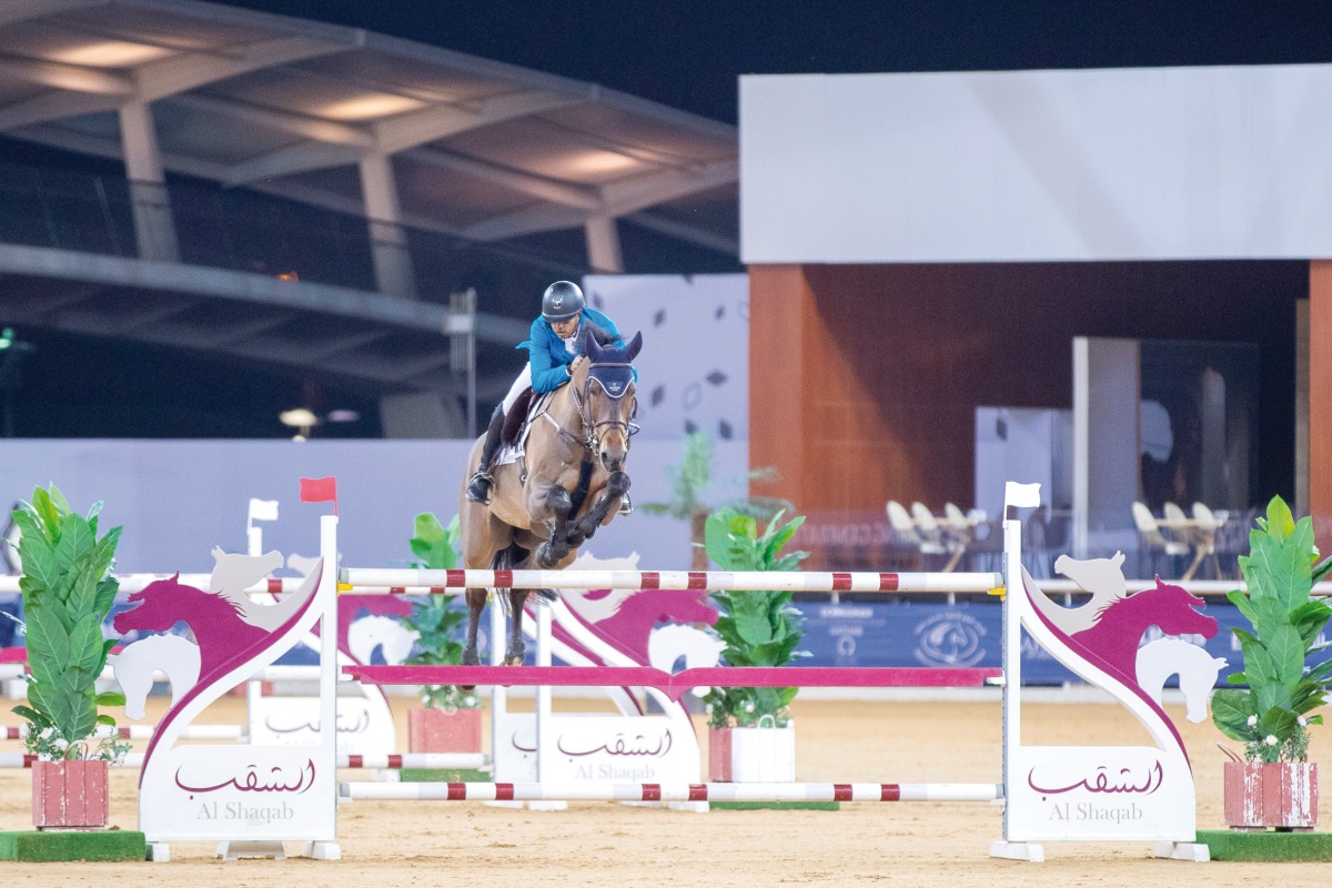 Qatari rider Bassem Hassan Mohammed guides F One Usa over a fence during the Big Tour of Longines Hathab Qatar Equestrian Tour at Al Shaqab yesterday.