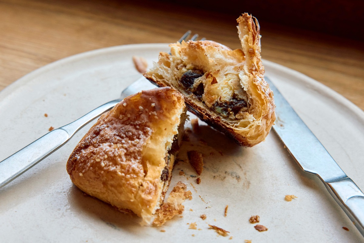 A croissant dough mince pie is pictured at Pophams bakery in London on December 20, 2024. Photo by BENJAMIN CREMEL / AFP