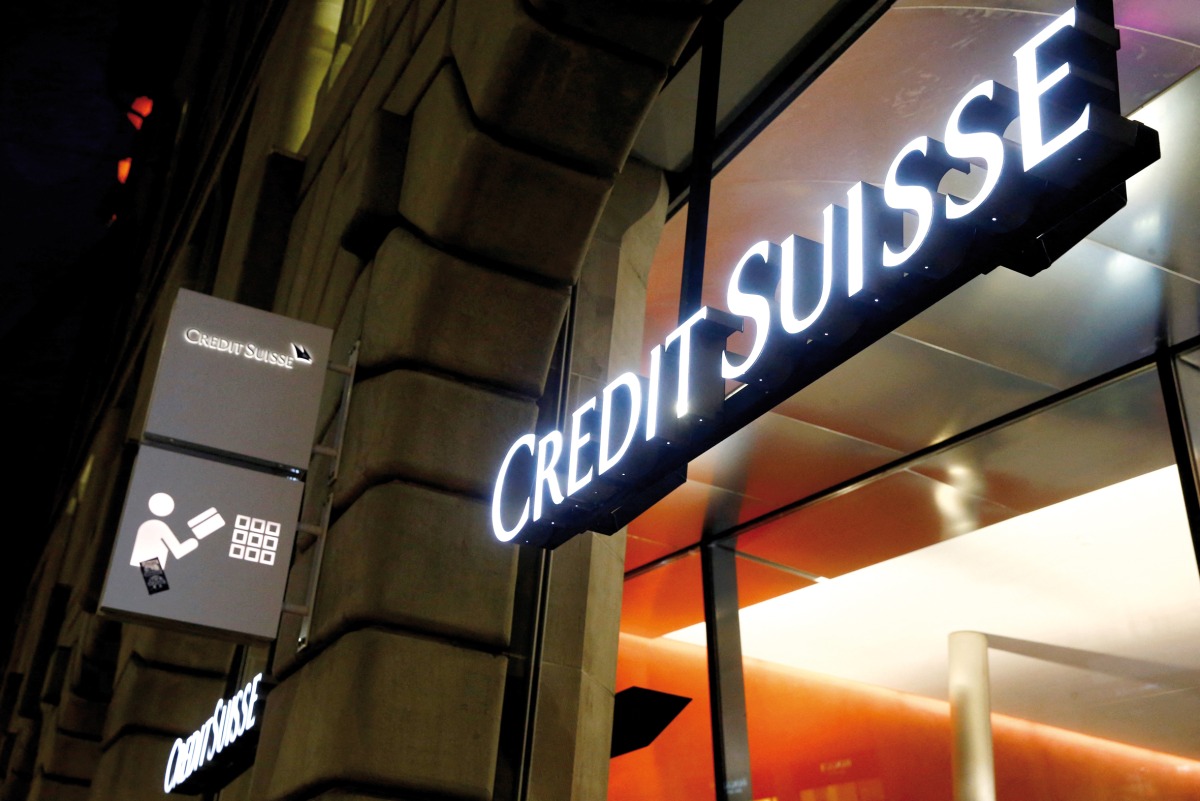 A file photo of the logo of Swiss bank Credit Suisse seen at a branch office in Zurich, Switzerland.